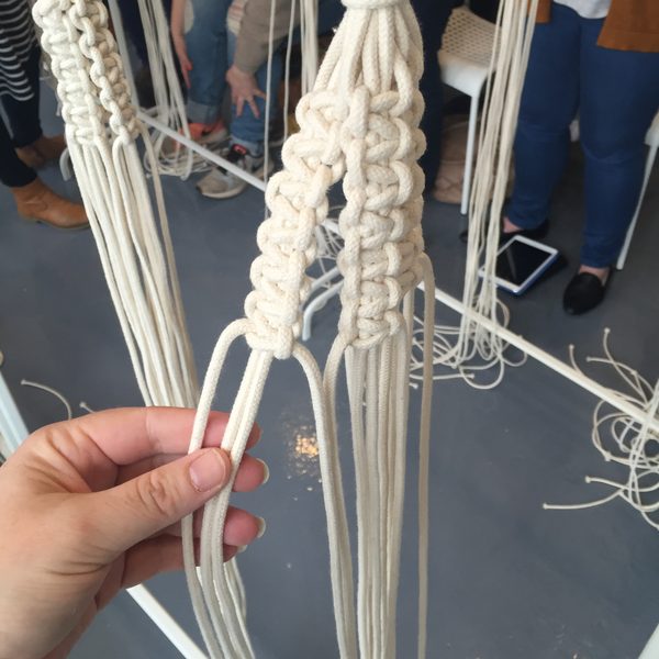 Knotted macrame cords at a workshop
